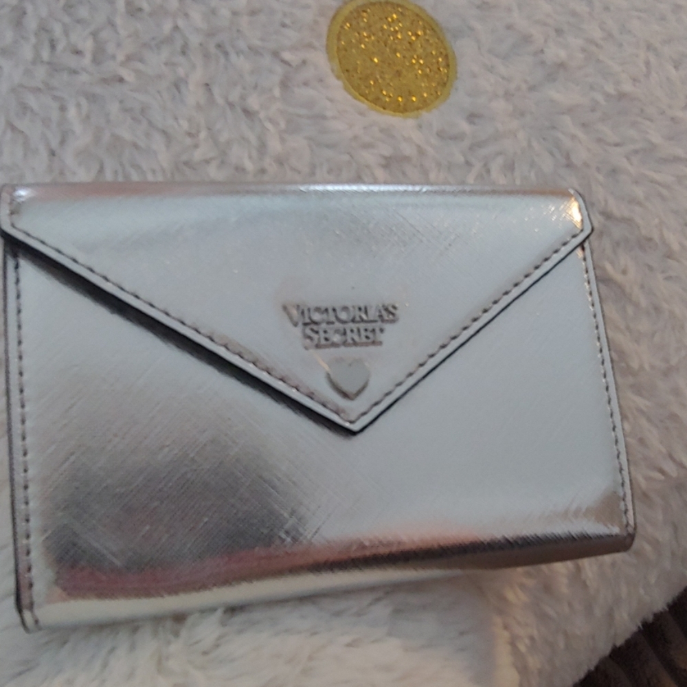 Victoria's secret wallet. Silver color